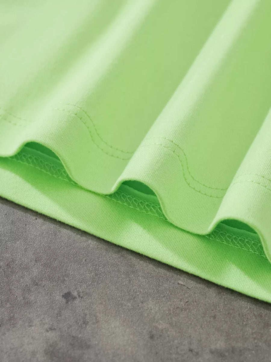 Lime green t-shirt with a soft cotton feel and visible stitching details.