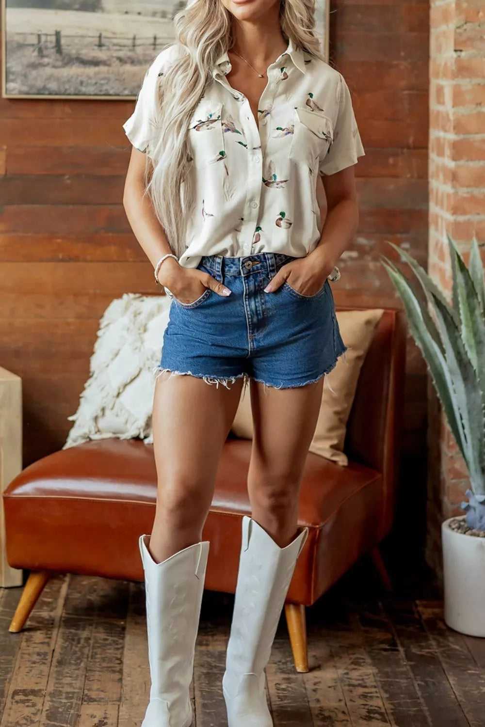 White button-up shirt with hip-length and button-front