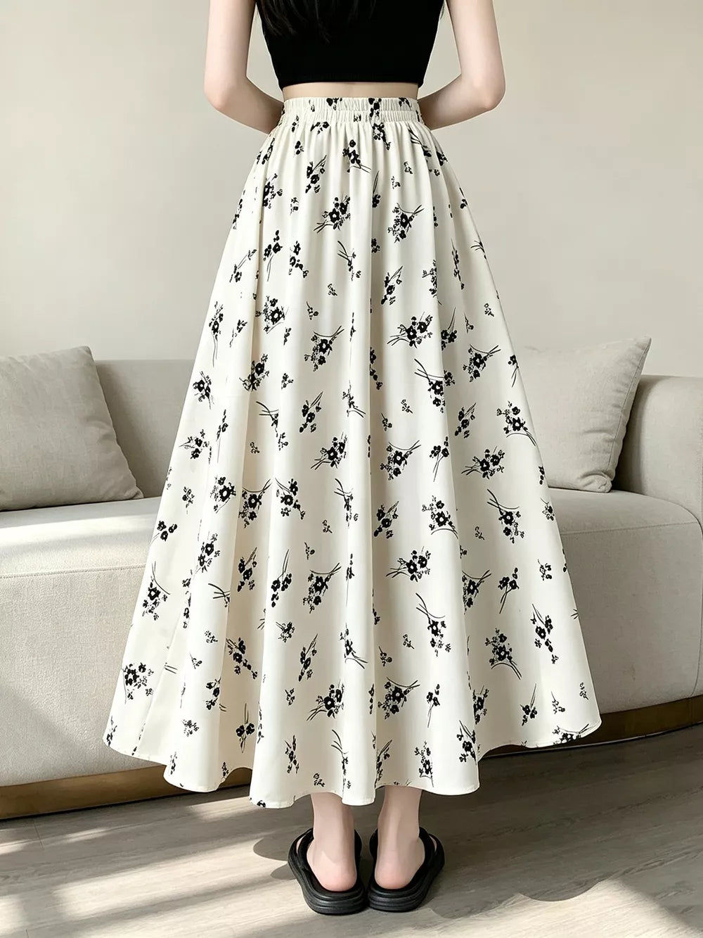A-line skirt featuring ditsy floral in black with 100% polyester Care instructions: Machine wash cold texture