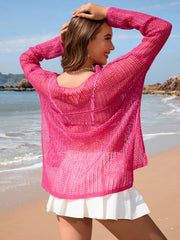 Hot Pink open-knit beach sweater with boat neck and long sleeves.