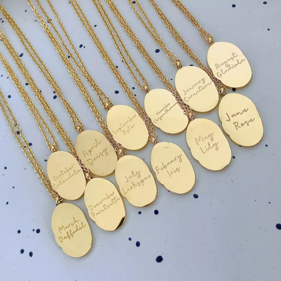 style three necklace featuring engraved and floral