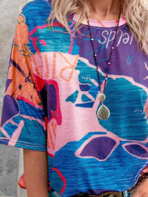 Brushstroke Stripe Casual T-shirt with abstract art print in pink, blue, purple, and orange.