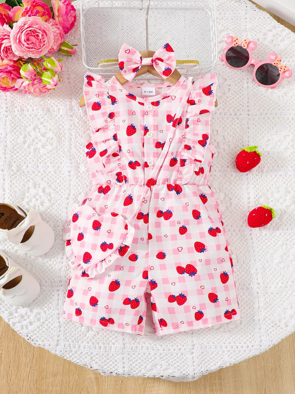 Strawberry ruffle jumpsuit with headband set, pink gingham, button-down, sleeveless, short length.