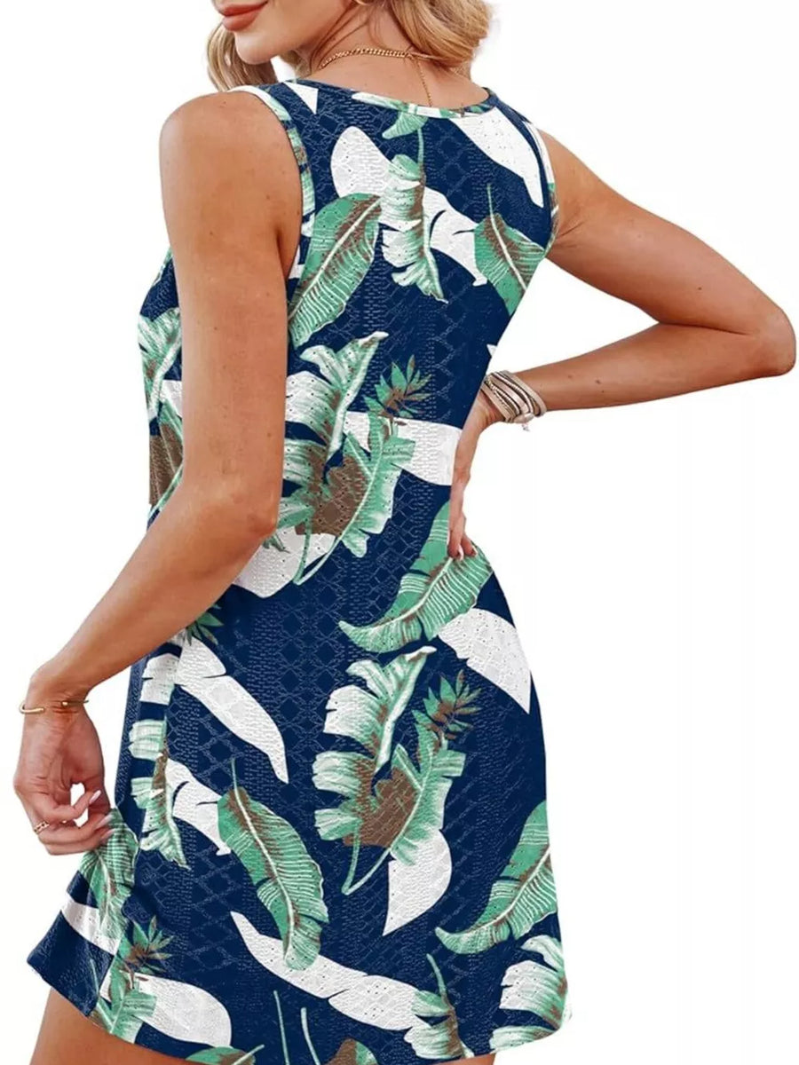 Eyelet twisted hem tank dress in multicolor tropical leaf print.