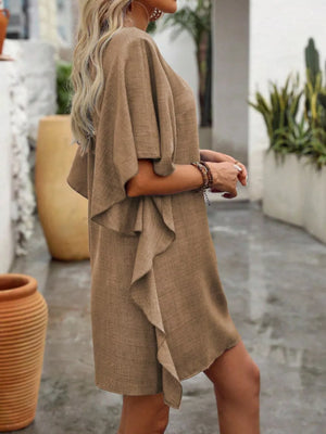Khaki V-neck mini dress with flowy sleeves and ruffled hem detail.