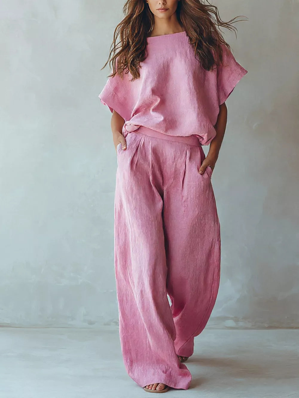 two-piece set in rose pink featuring pocketed and relaxed fit