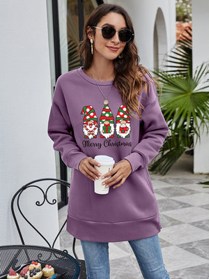 Purple tunic sweatshirt with Christmas gnomes and Merry Christmas graphic.