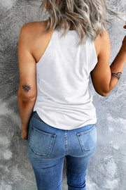 White halter tank top with a comfortable fit, paired with blue denim jeans.