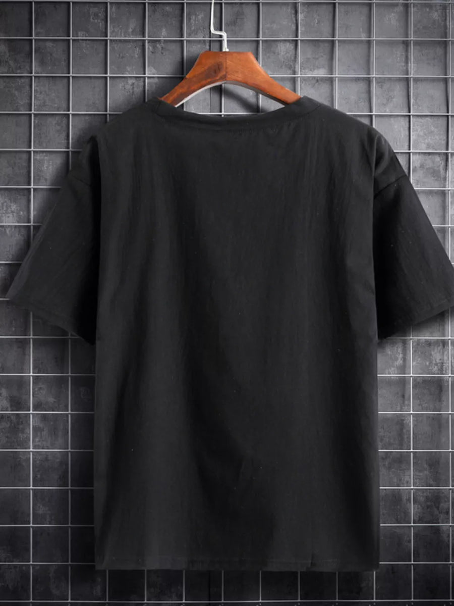Black cotton crew tee, short sleeves, classic fit.