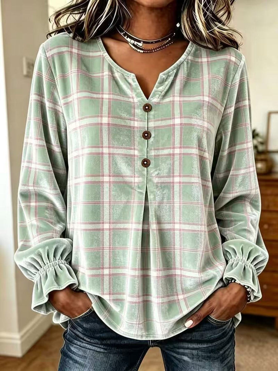 Mauve blouse featuring ruffled and plaid