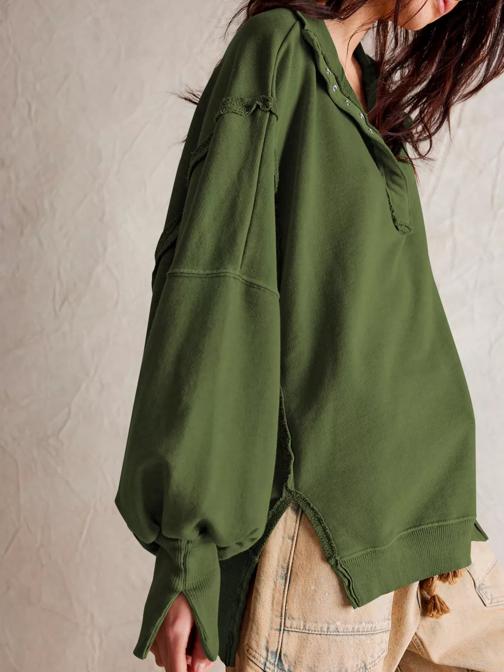 100% polyester Care instructions: Machine wash cold sweatshirt in Army Green with oversized silhouette