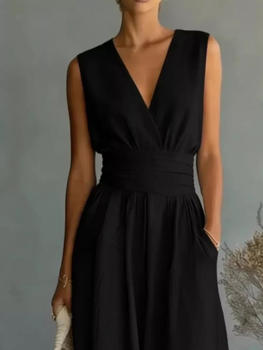Black sleeveless V-neck midi dress with a cinched waist and pockets