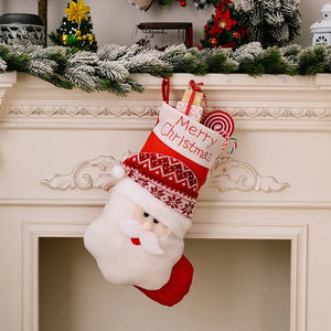 Santa Claus Christmas stocking with Merry Christmas text and holiday treats spilling out.