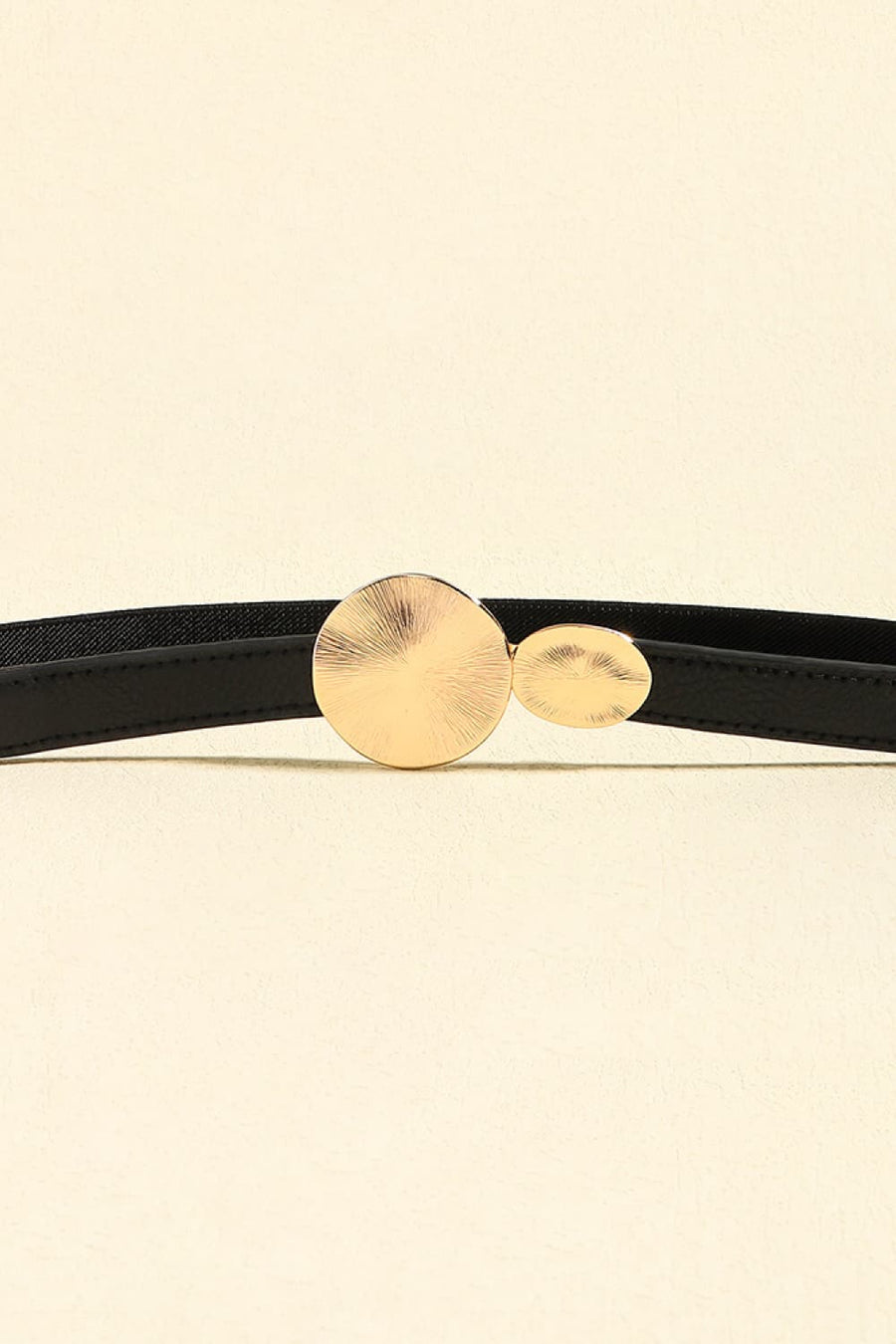 Black elastic waist belt with gold disc detail buckle