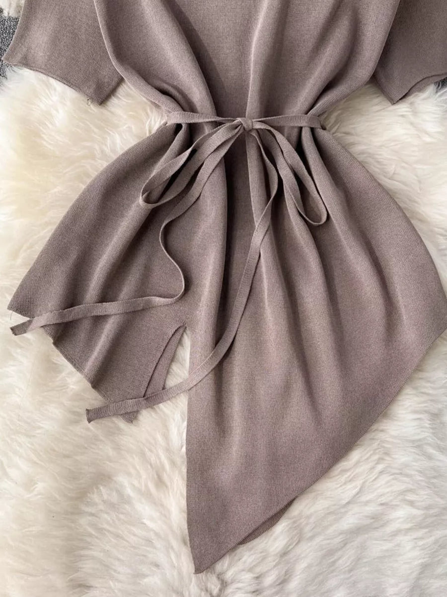 Tied waist two-piece set in khaki with wide legs and asymmetric hem detail.