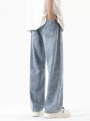 Light blue vintage wash wide-leg jeans with distressed detail on back pocket.