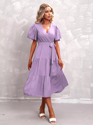 Lavender tiered midi dress with flutter sleeves and belted waist