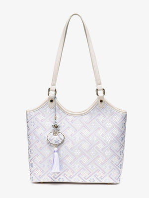 shoulder bag in Pink Purple with geometric and shoulder straps