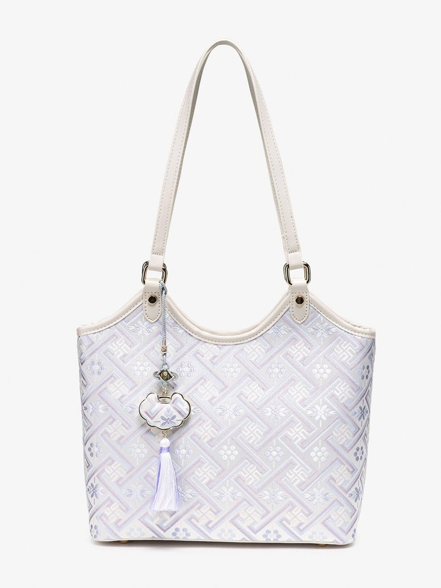 shoulder bag in Pink Purple with geometric and shoulder straps