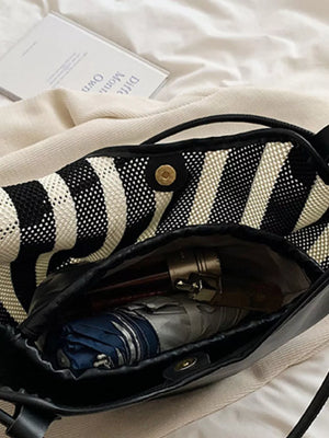 handbag featuring striped in white with Polyester Imported Size &amp texture
