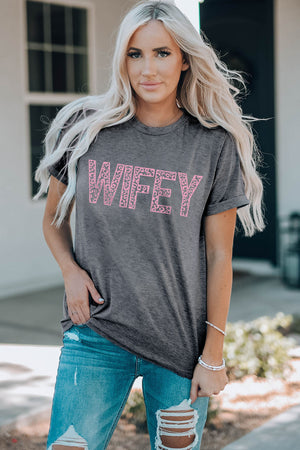 Mid gray graphic tee with pink leopard print "Wifey" text, crew neck, and short sleeves.