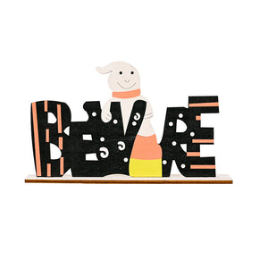 Halloween word block decor with ghost and candy corn detail, black with orange stripes and white dots.