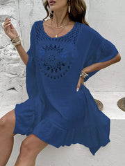 Indigo crochet trim cover-up dress with ruffled hem and short sleeves.