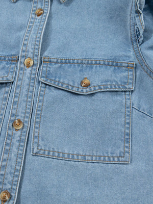 Light wash denim button-down shirt with two chest pockets and ruffled details.