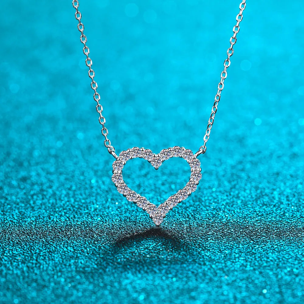 Silver open heart moissanite pavé pendant necklace with delicate chain.