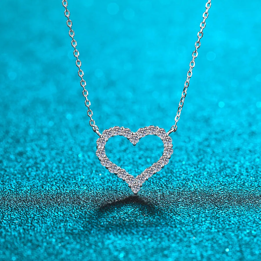 Silver open heart moissanite pavé pendant necklace with delicate chain.