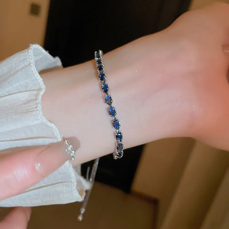 Platinum-plated, Alloy, Copper, Zircon Care instructions: Avoid wearing during e bracelet in royal blue with fitted
