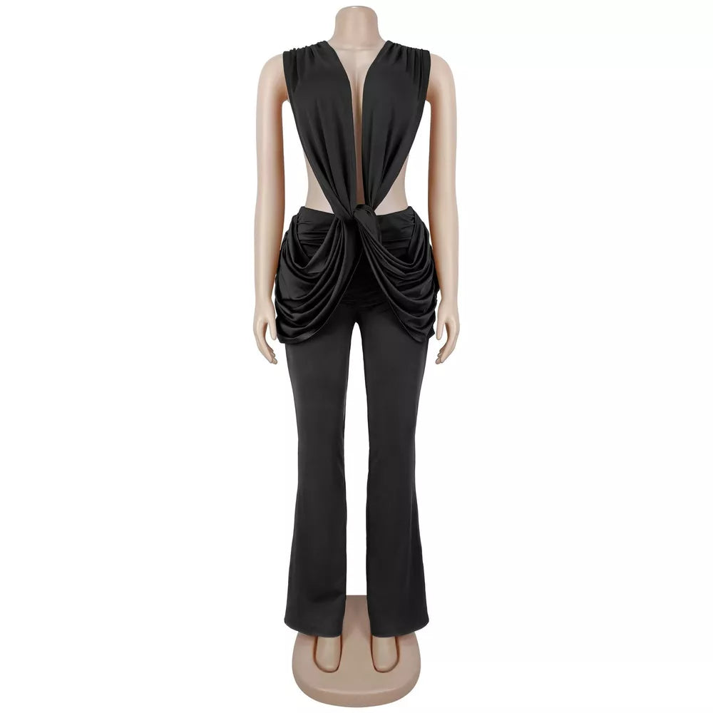 100% polyester Care instructions: Machine wash cold jumpsuit in Blush Pink with flared silhouette