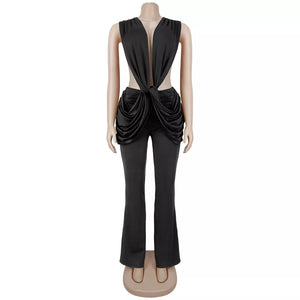 100% polyester Care instructions: Machine wash cold jumpsuit in Blush Pink with flared silhouette