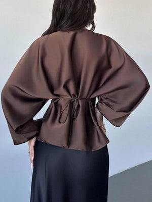 blouse in black with round neck and bishop sleeve