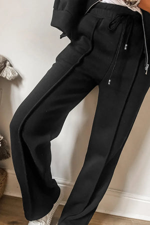Black seamed joggers with drawstring waist and zip-up lounge set detail