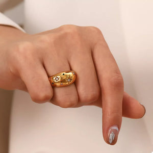 gold ring with zircon embellishment and null
