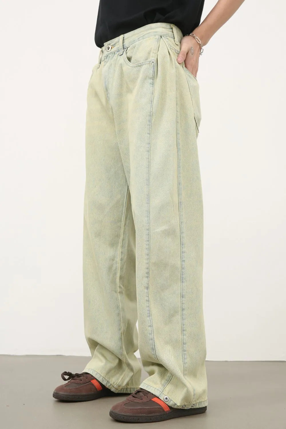 Acid wash wide leg denim trousers in sage, featuring a relaxed fit and casual styling.