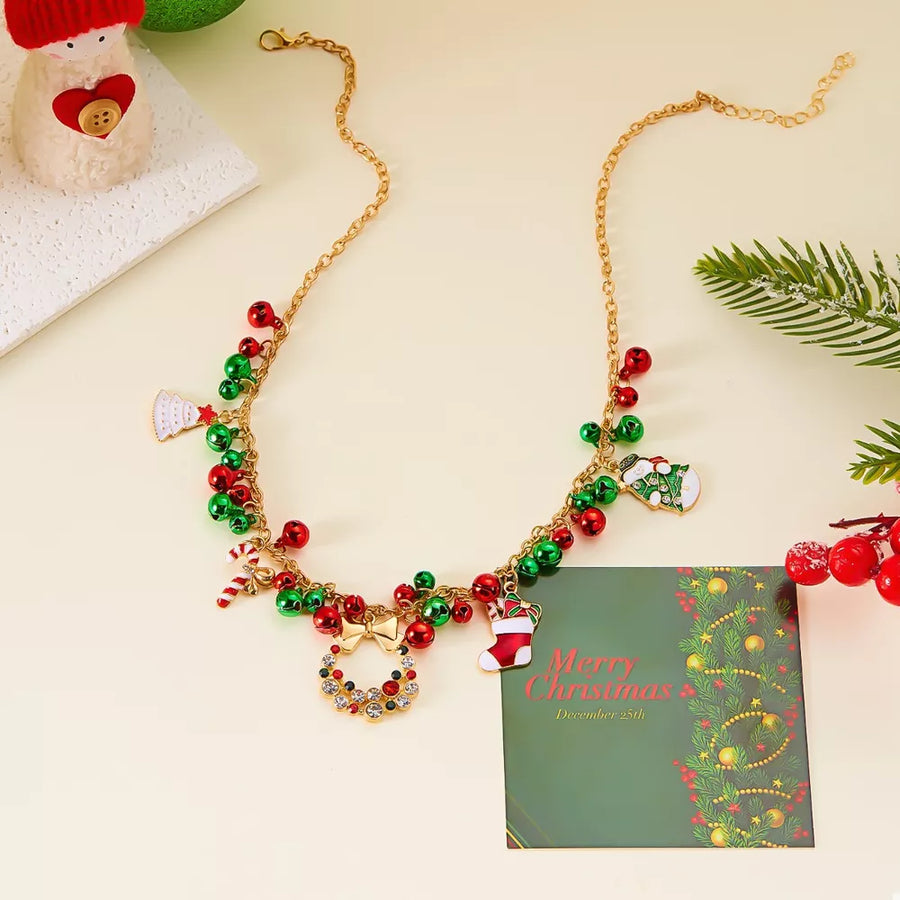 18K Gold-Plated, Alloy, Rhinestone Care instructions: Avoid wearing during exerc necklace in green with draped silhouette