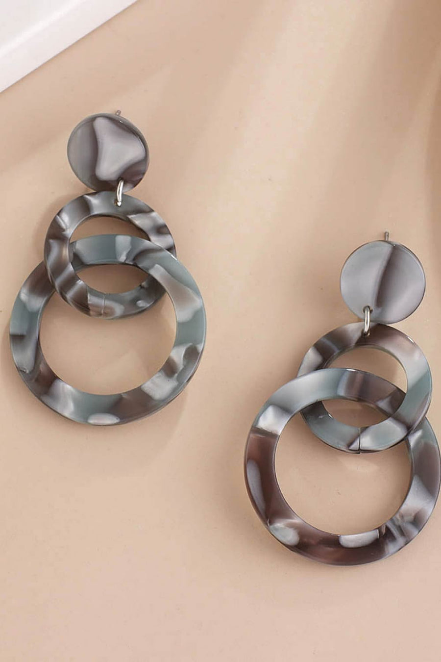 Gray marbled acrylic drop earrings with three interlocking rings