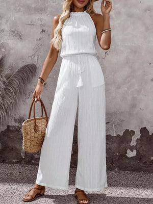 White crinkled halter jumpsuit with drawstring tassel and wide legs