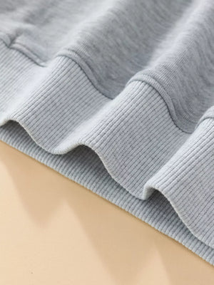 Light gray baby sweatshirt with ribbed cuffs and hem detail
