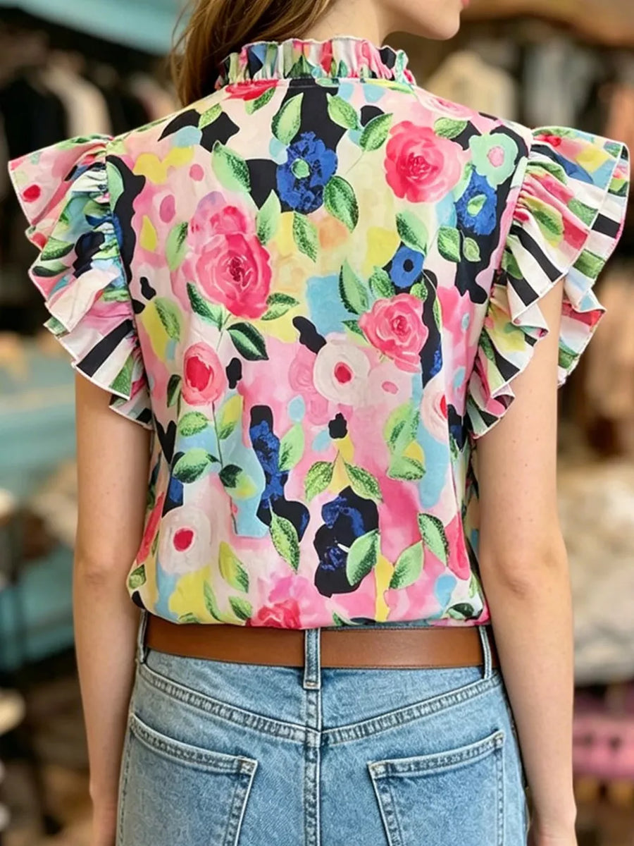 Floral print ruffled sleeve shirt with a high neckline.