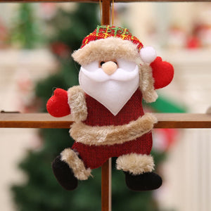 Red Santa Claus Christmas ornament with fuzzy trim and plaid hat.