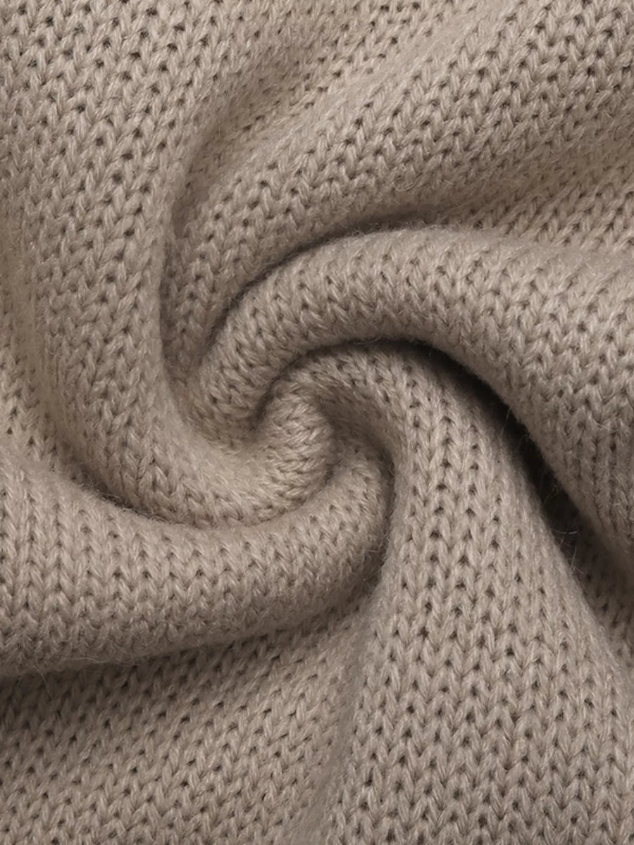 Gray apricot knit cardigan with a textured stitch detail and soft fabric.