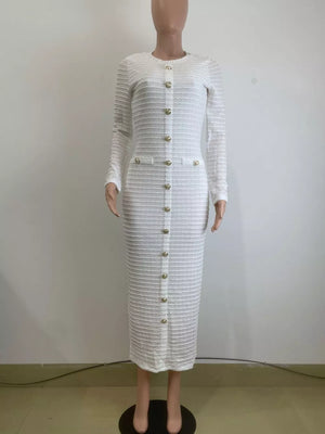 White textured midi dress with crew neck, long sleeves, and decorative gold buttons.