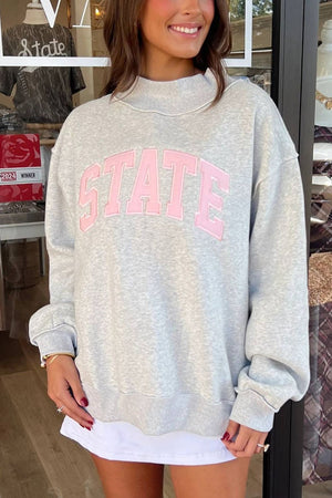 light gray sweatshirt with graphic-print and mock neck