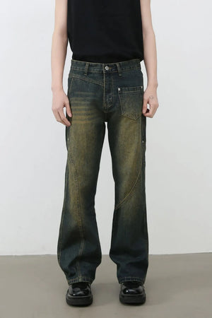 Dark faded seam detail bootcut jeans with a distressed wash.