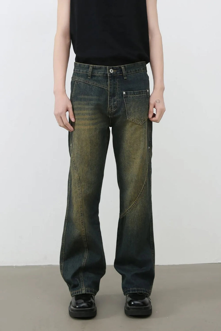 Dark faded seam detail bootcut jeans with a distressed wash.