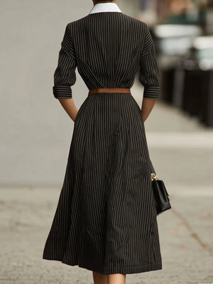 white midi dress featuring buttoned and striped
