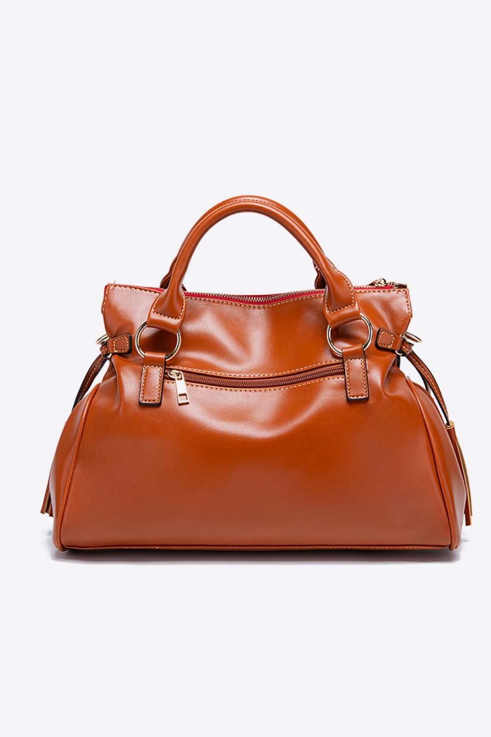 Caramel structured satchel bag with tassel detail and gold hardware.